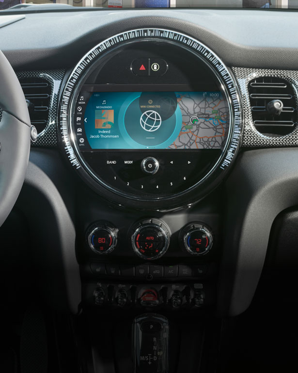 Closeup view of the dashboard and 8.8” touchscreen media display inside a MINI Hardtop 4 Door.